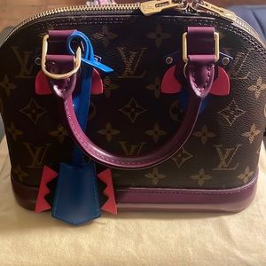 Louis Vuitton Totem Magenta Handbag